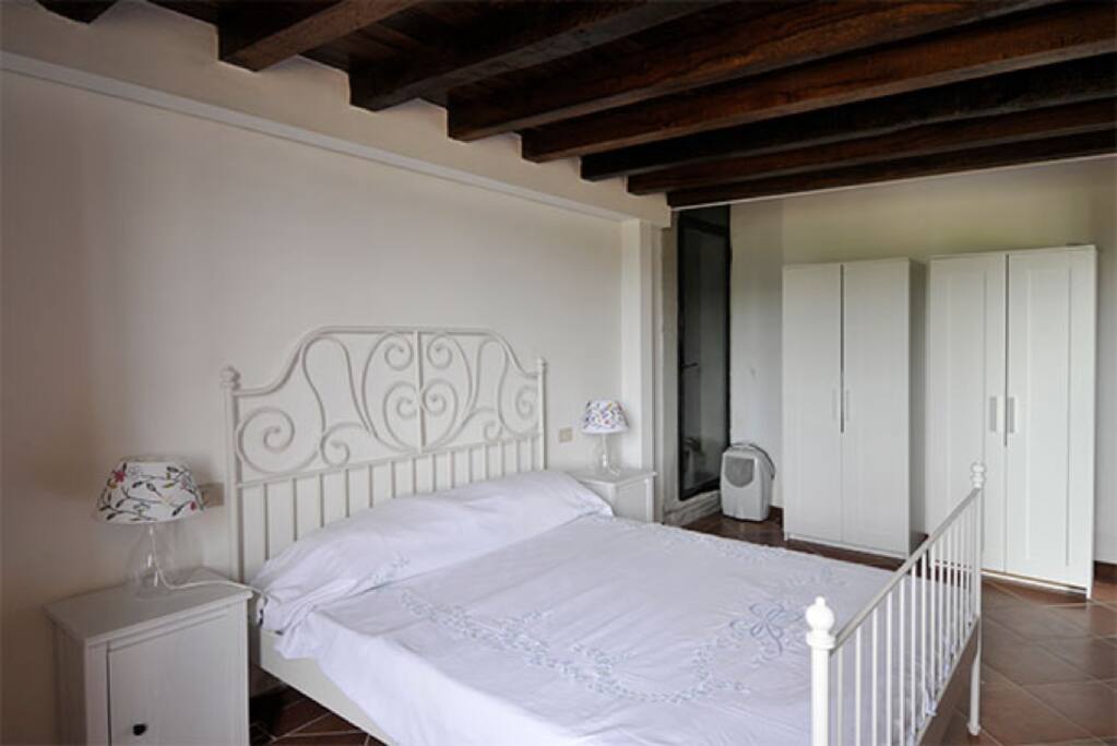 Spacious double bedroom equipped with two wardrobe and a cupboard