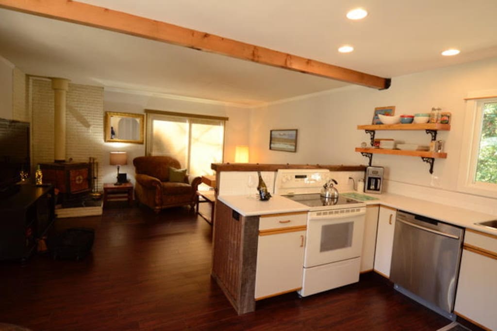 You can cook in the kitchen while serving drinks at the custom built bar.