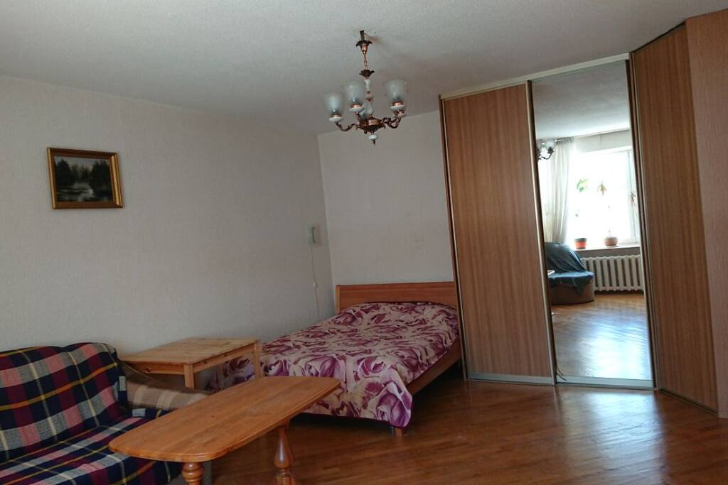 In the room there are 4 sleeping places: a bed and a sofa