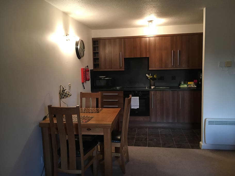 Fully equipped kitchen and dining area.