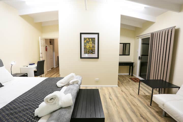 Wattle has it own outside access and direct access in the room to the  kitchen / laundry facility. 

