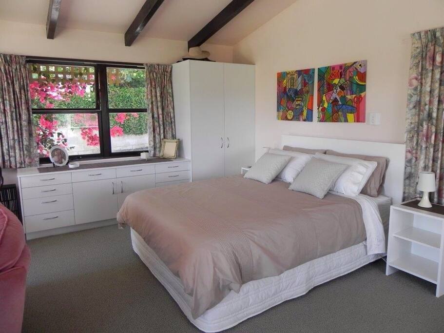 Very comfortable queen-sized bed with quality bedding.