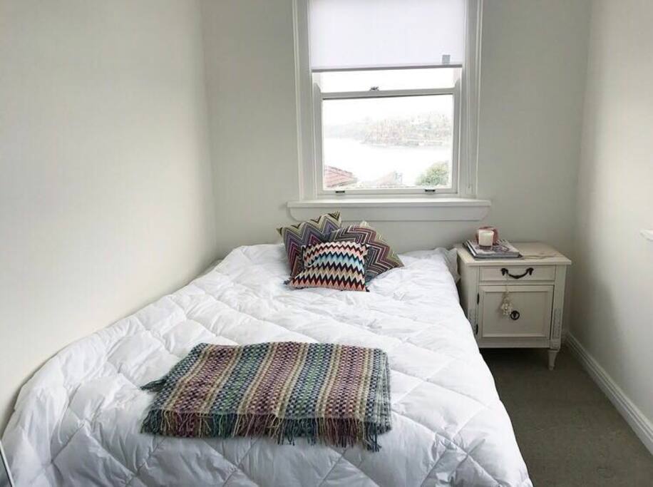 Spare bedroom with ocean views