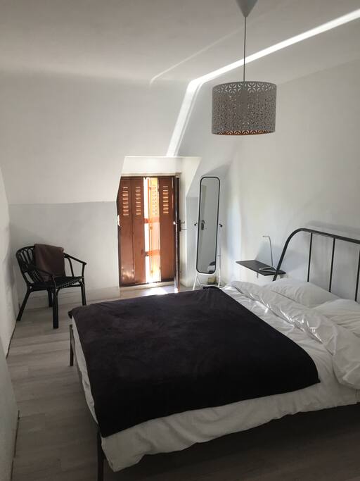 A spacious room - the former grain store- which can comfortably accommodate a family of 4
