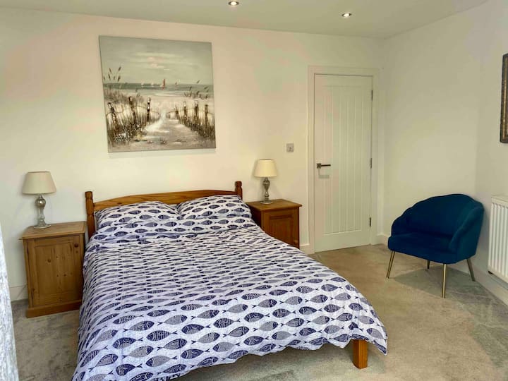 Double bedroom on ground floor leading with access to garden 
