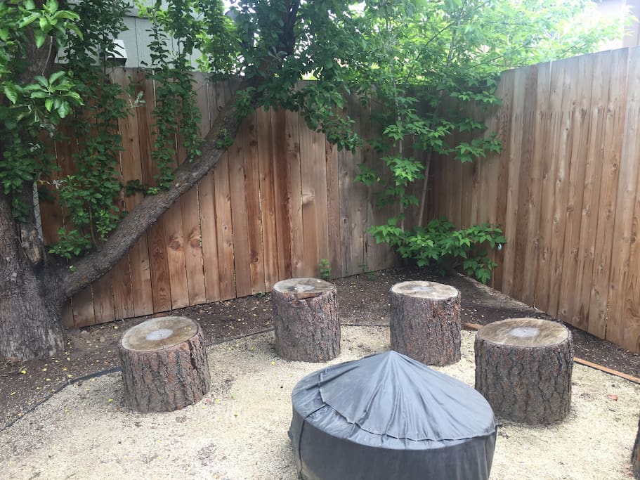 Cozy fenced in backyard.