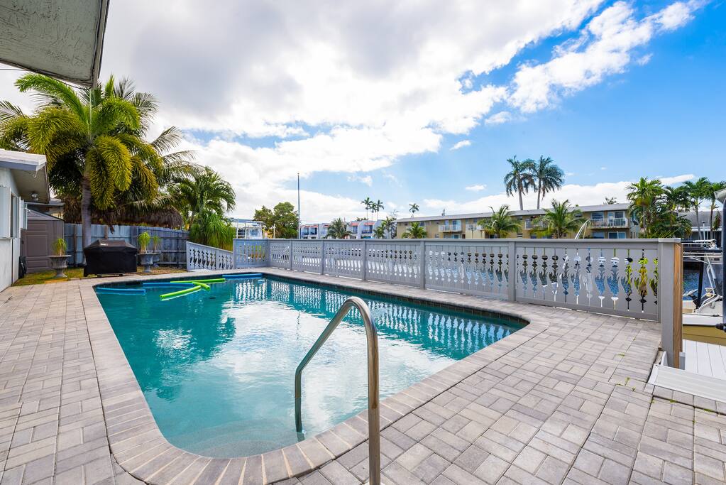 Spend lazy afternoons floating in the waterfront heated pool, soaking up the Florida sun