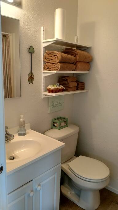 Fully stocked bath with shower