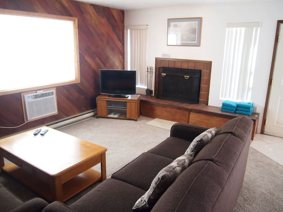 Living Room with fire place and flat screen
