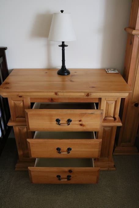 Large nightstand / small dresser available for use- lamp and three empty drawers