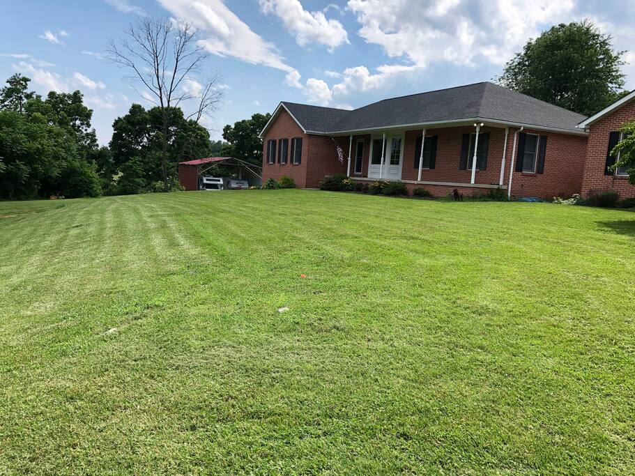 House located on 12 acres of orchard ground.