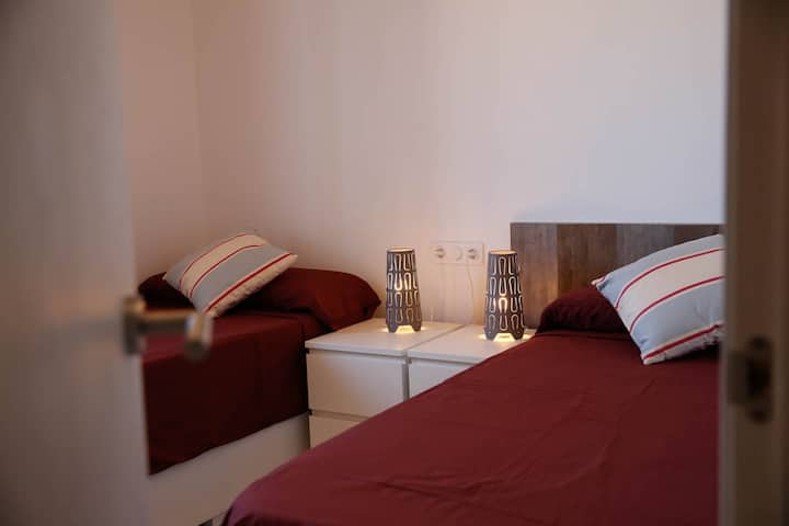 Another bedroom with two bachelor beds (90cm). They can be put together to make a 180cm one. Also with built-in closet.