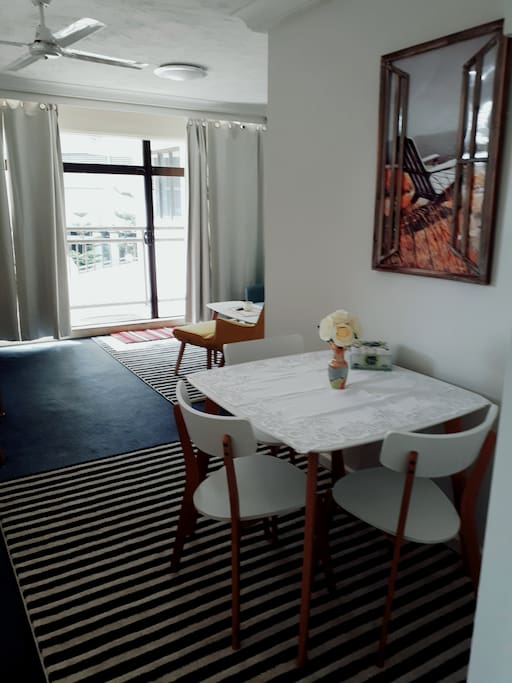 Dinning room and apart of living room that Leads you to the deck.