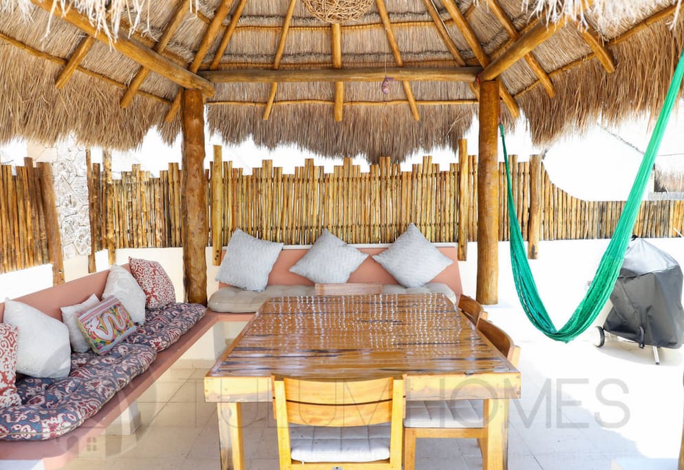 Take shelter from the sun under your own private palapa