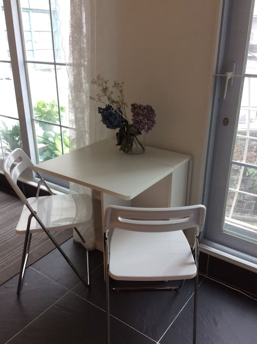 Dining table opens up if more space required