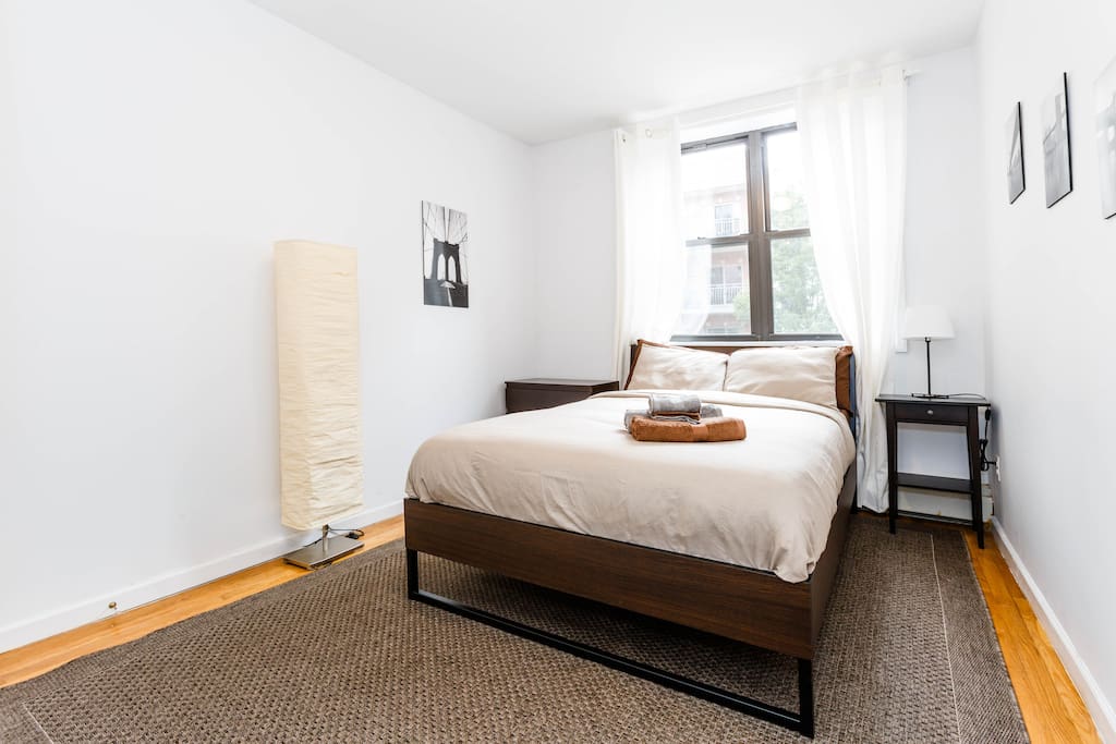 The first bedroom has plenty of closet storage, and a full bed.