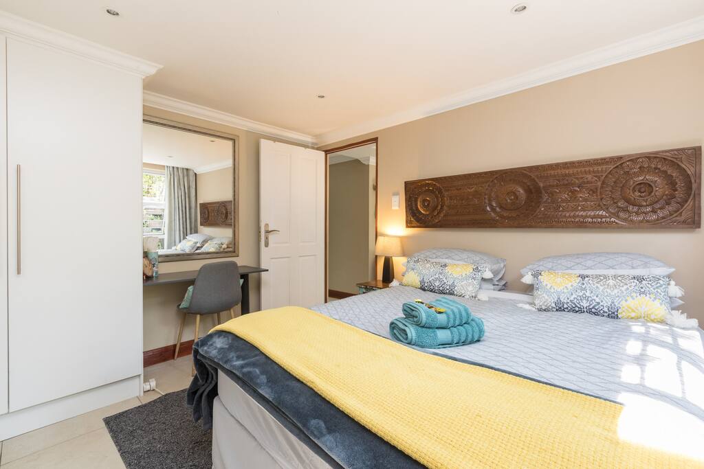 Built in cupboard and working desk in bedroom