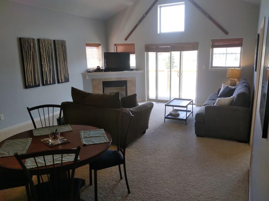 Dining area/living room with gas fireplace and gorgeous views