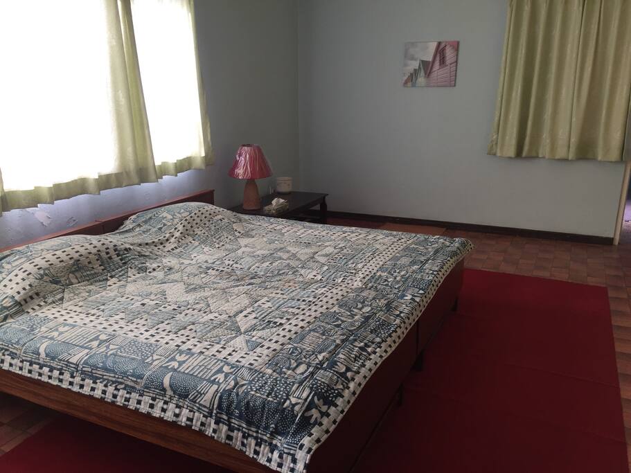 Two separate beds; joined if you wish. AC, ample wardrobe facilities..Neat and tidy.