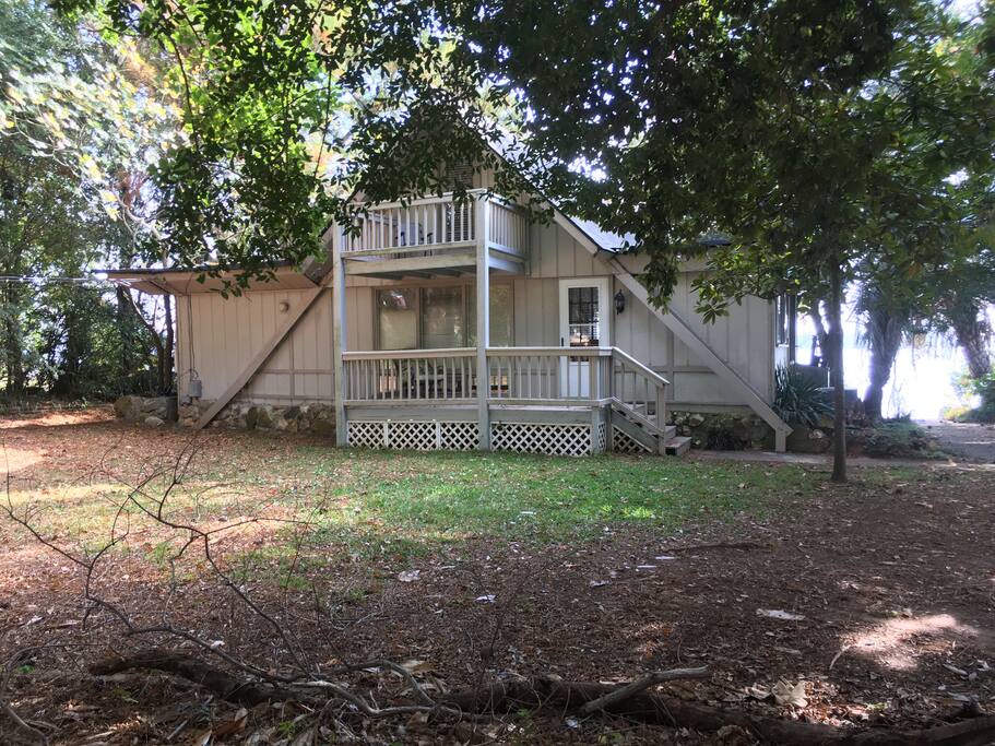 front of house lake view behind