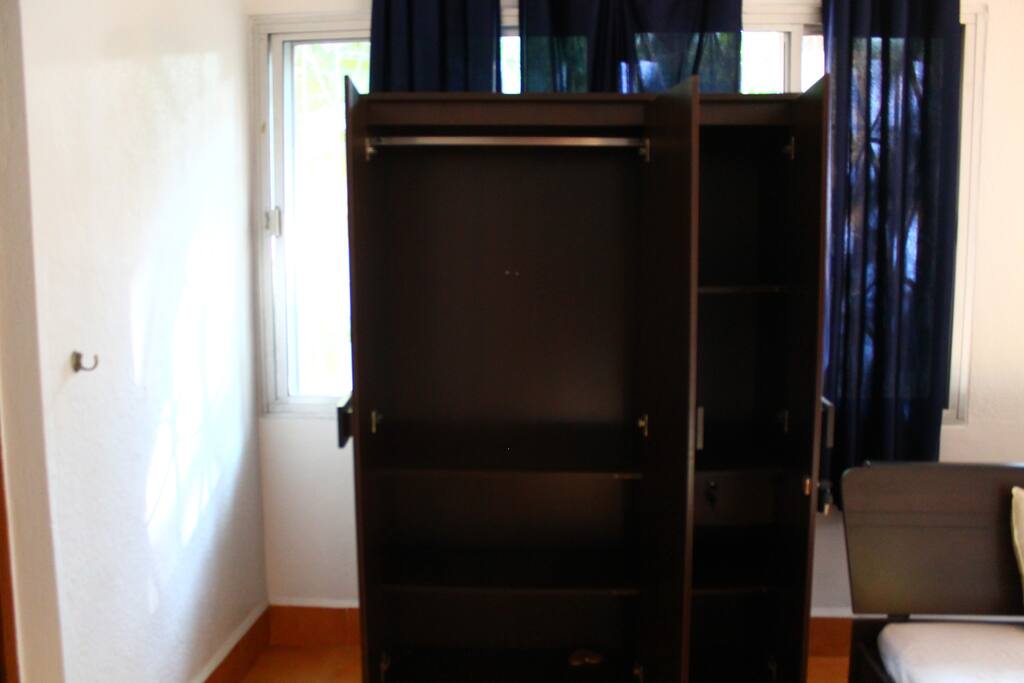 Cabinet - right portion is lockable. Lockable drawer too within right portion.