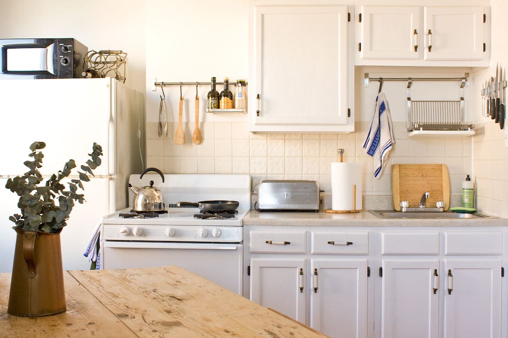 The full kitchen is stocked with all the basics for you to prepare meals at home.