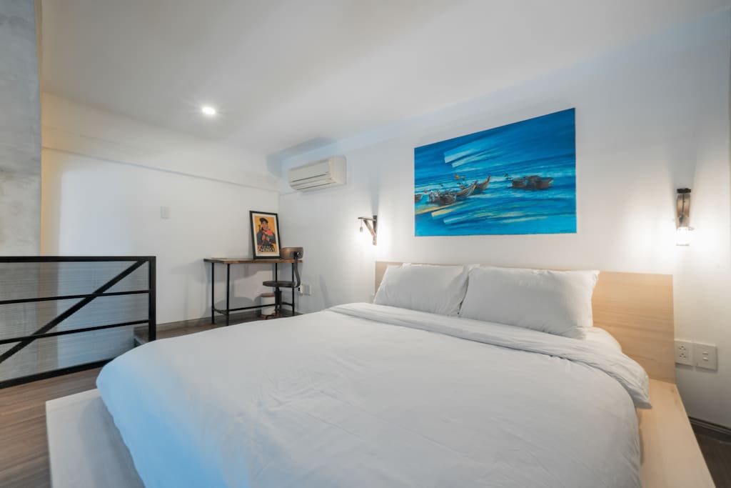 Enjoy a deep sleep in our loft bedroom. Features a hotel-quality queen bed, and work desk and chair