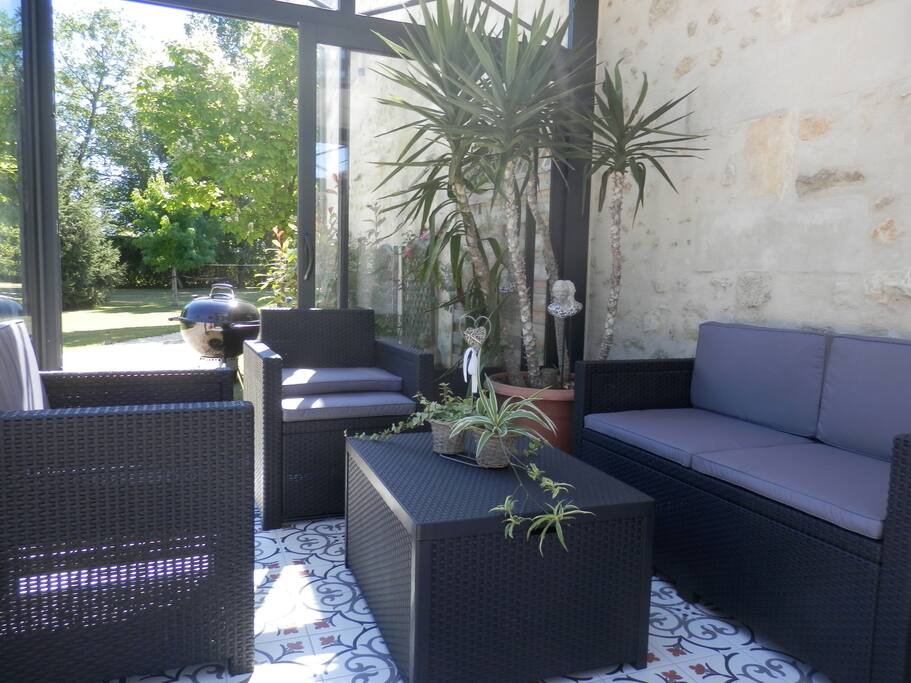 Véranda coin détente.