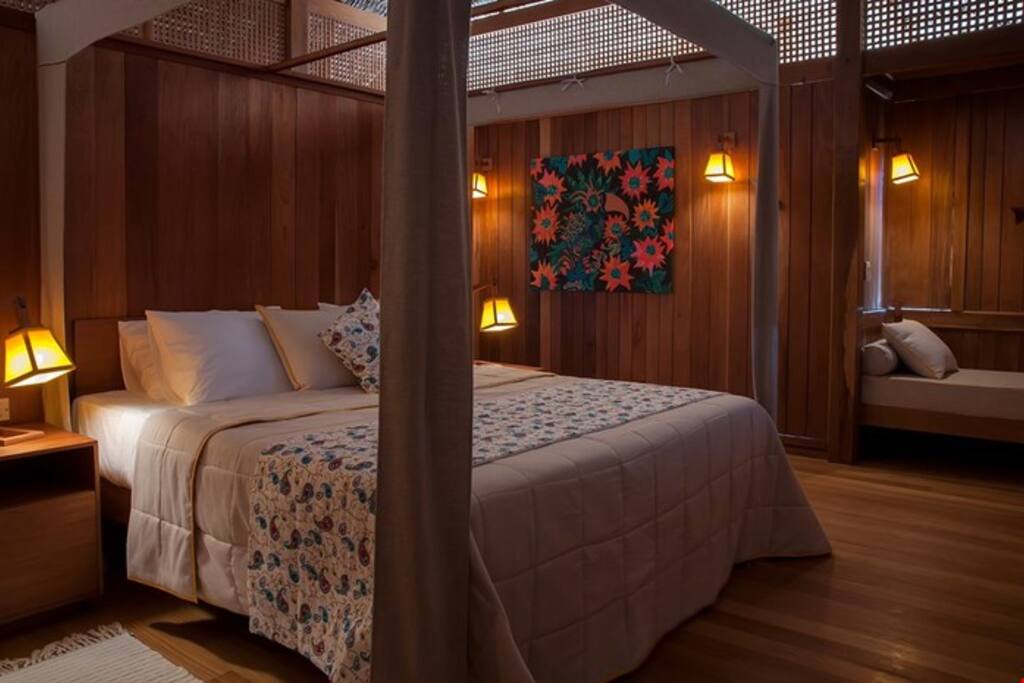 Get a good night's sleep on the full-sized mattress with Brazilian rustic decor.
