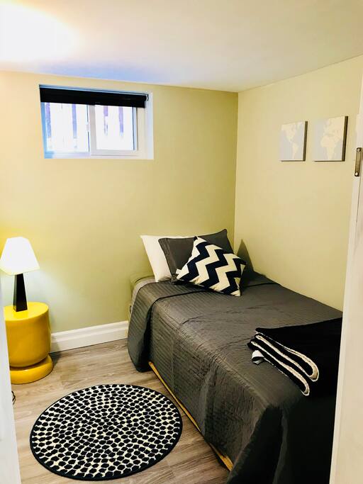 Small bedroom, single bed . Closet area off to side