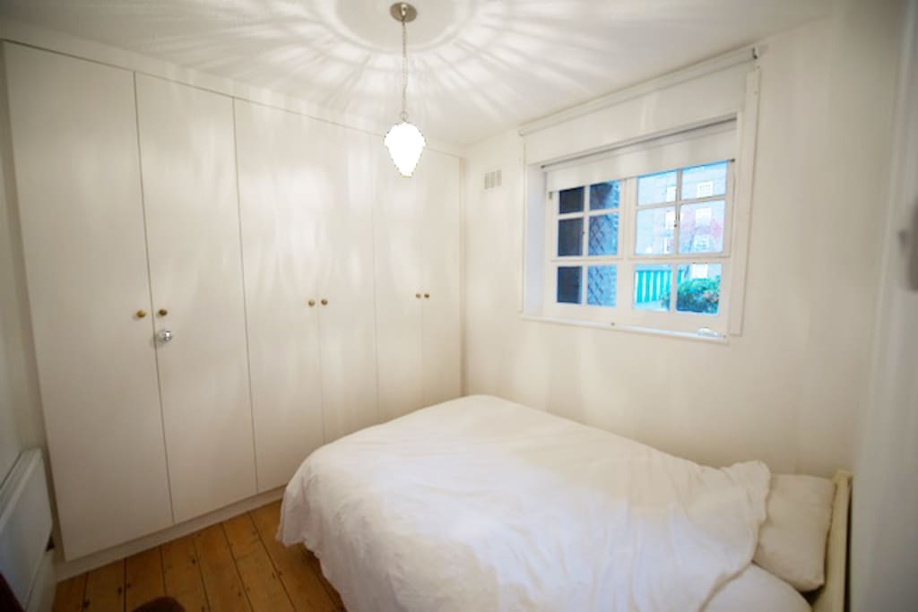 Bedroom looking out onto quiet courtyard