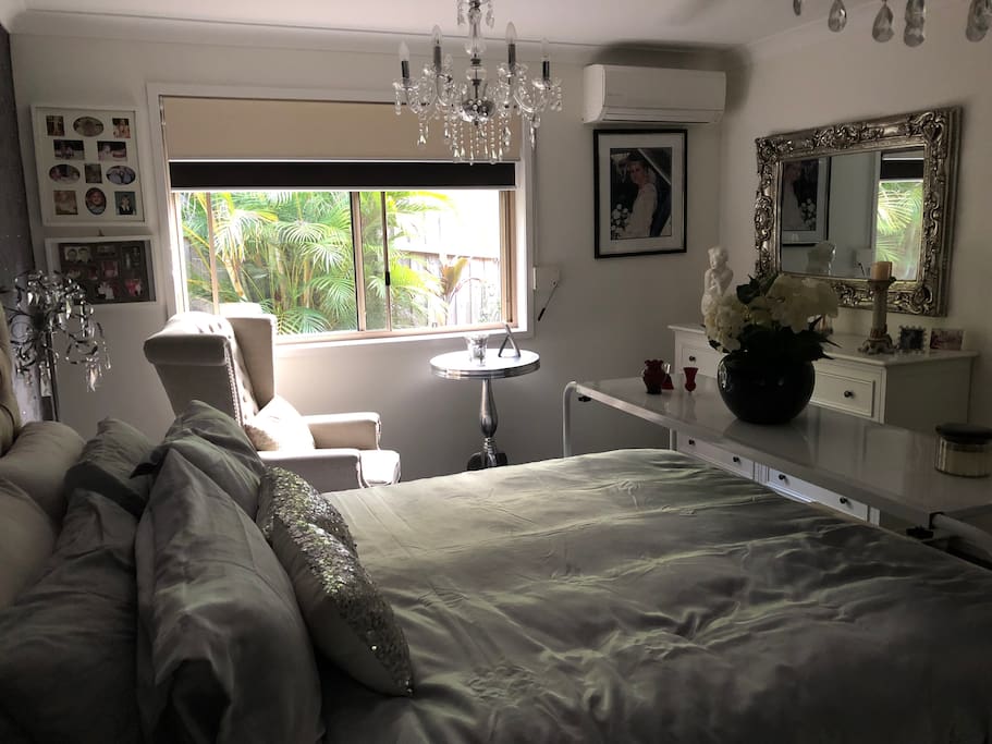 Enjoy the palm garden from the main suite