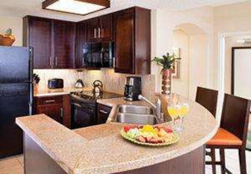 Conveniently located fully equipped kitchen to prepare meals or snacks