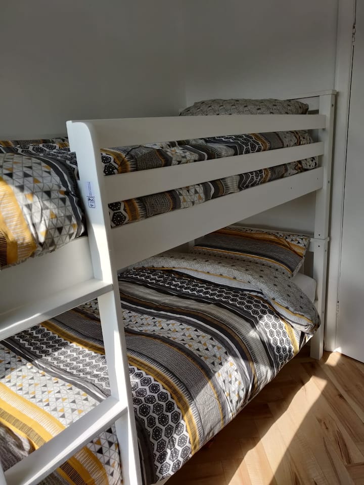 New bunk bed in the kids room with brand new mattresses and bedding 