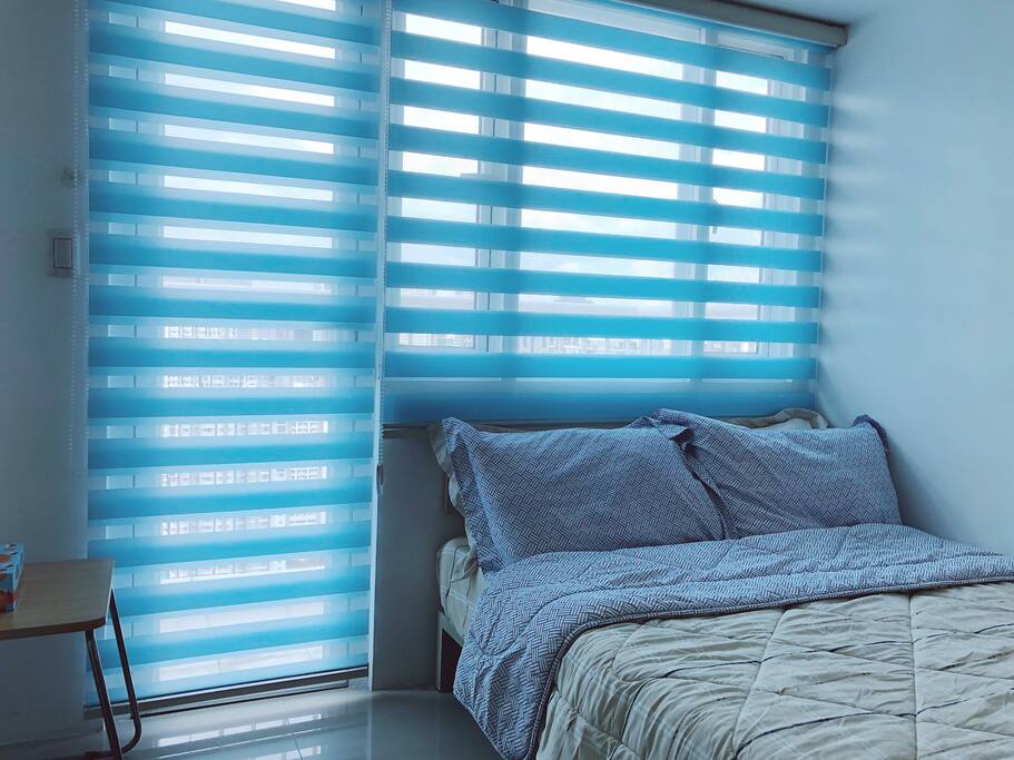 You can access the balcony through the bedroom