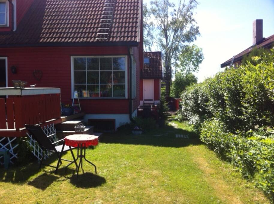 The garage is seen behind the house