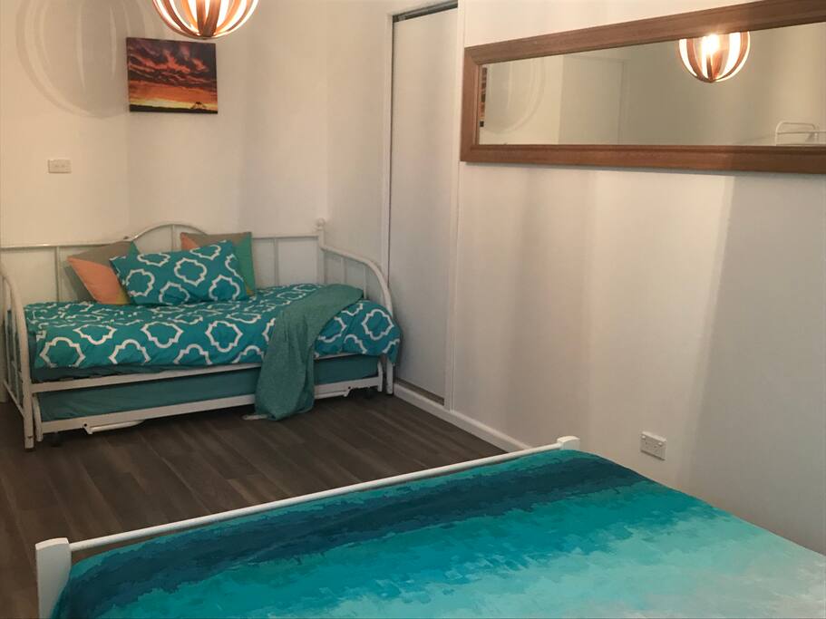 Queen bed , single bed, and single trundle