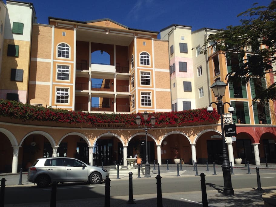 Small piazza with coffee shops & restaurants, pharmacy & medical centre nearby.