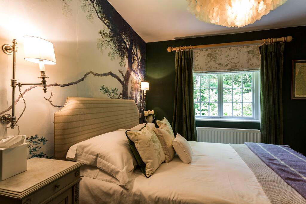 Bedroom with king size bed and en suite shower room