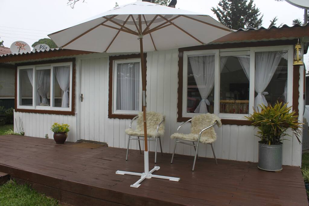 Area externa - deck e guarda-sol