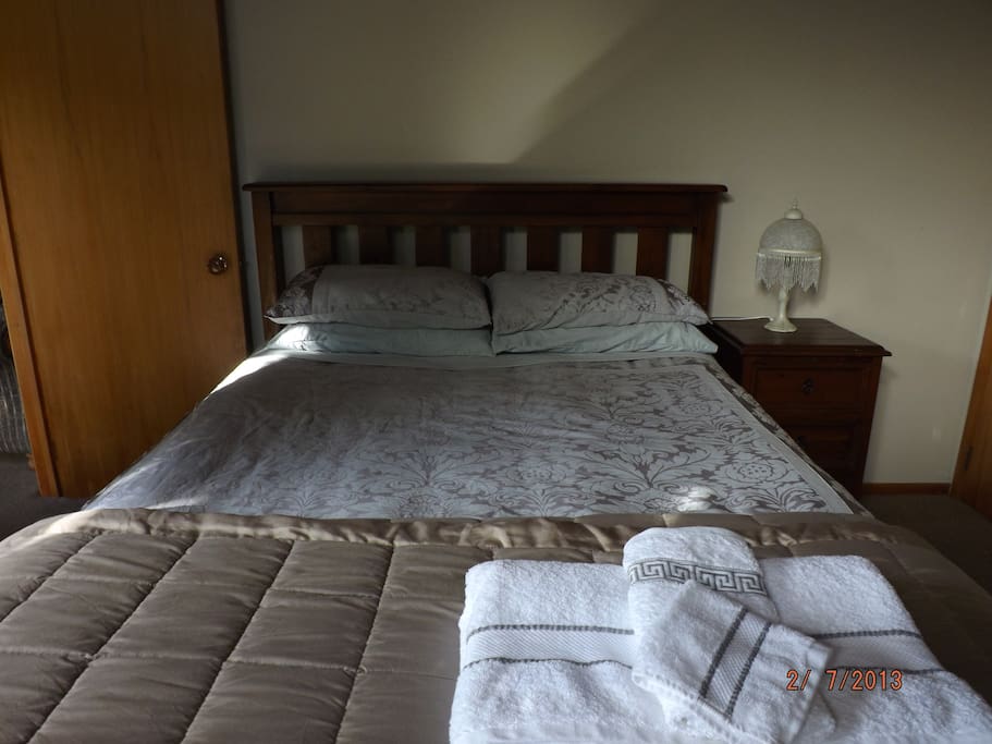 Bedroom one - queen size bed with adjoining ensuite