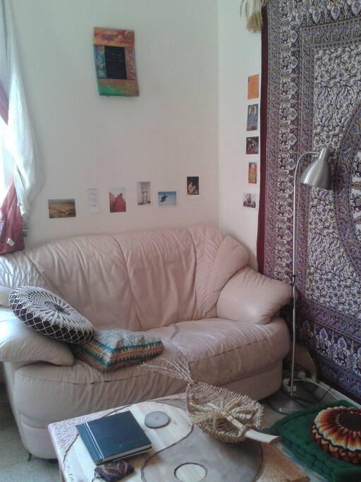 In the room there is a place to sit, read a book, relax and host a friend in privacy