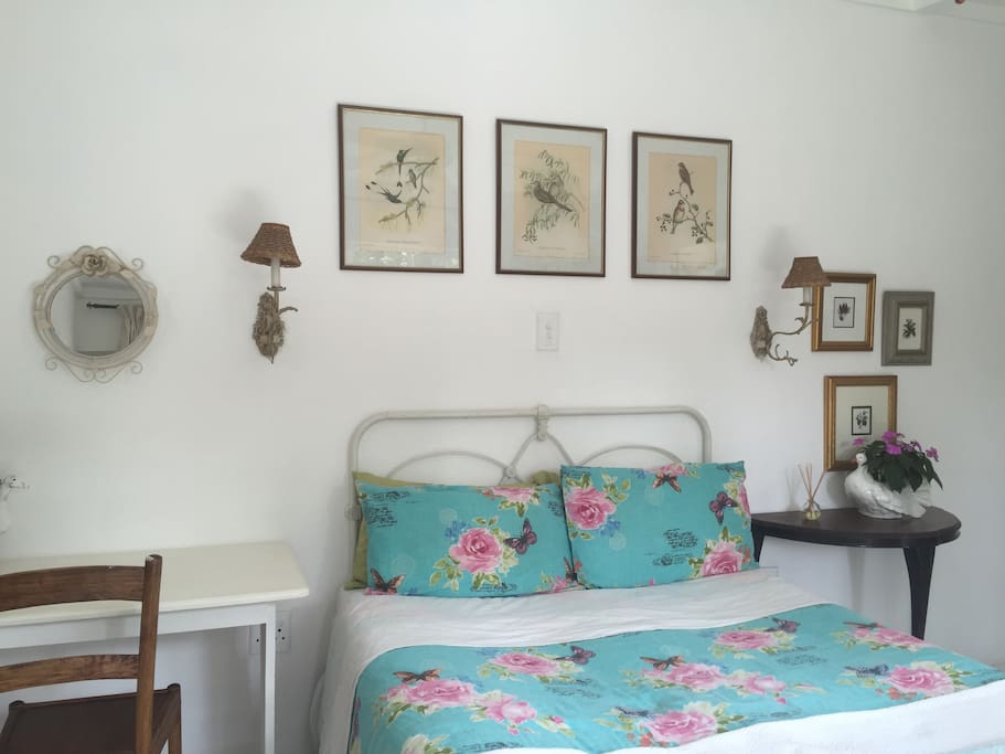 comfy double bed with pretty linen and electric blanket