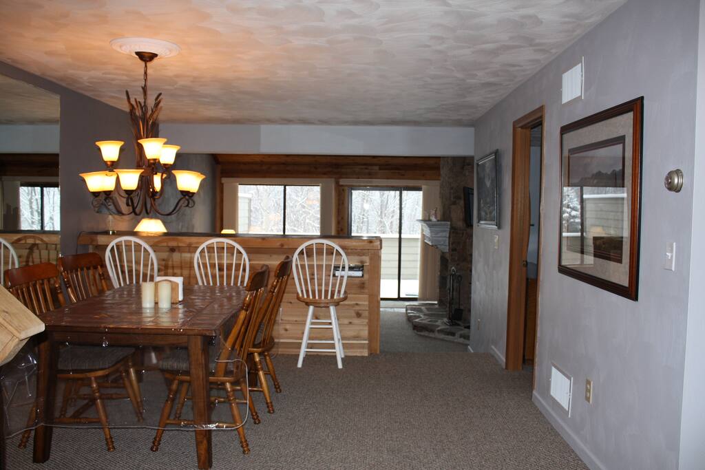 From the dining room step down into the sunken living room.