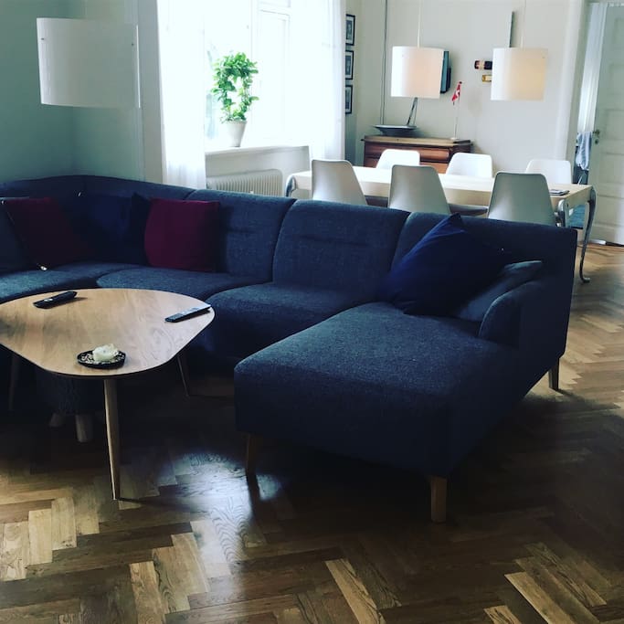 Livingroom. Big sofa, big TV, dinner table (8 seats)
