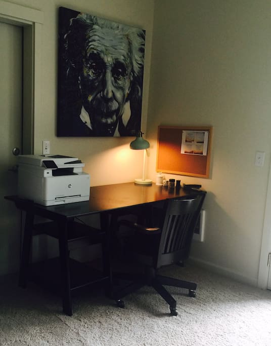Our home includes a work space with a wireless printer and wifi.