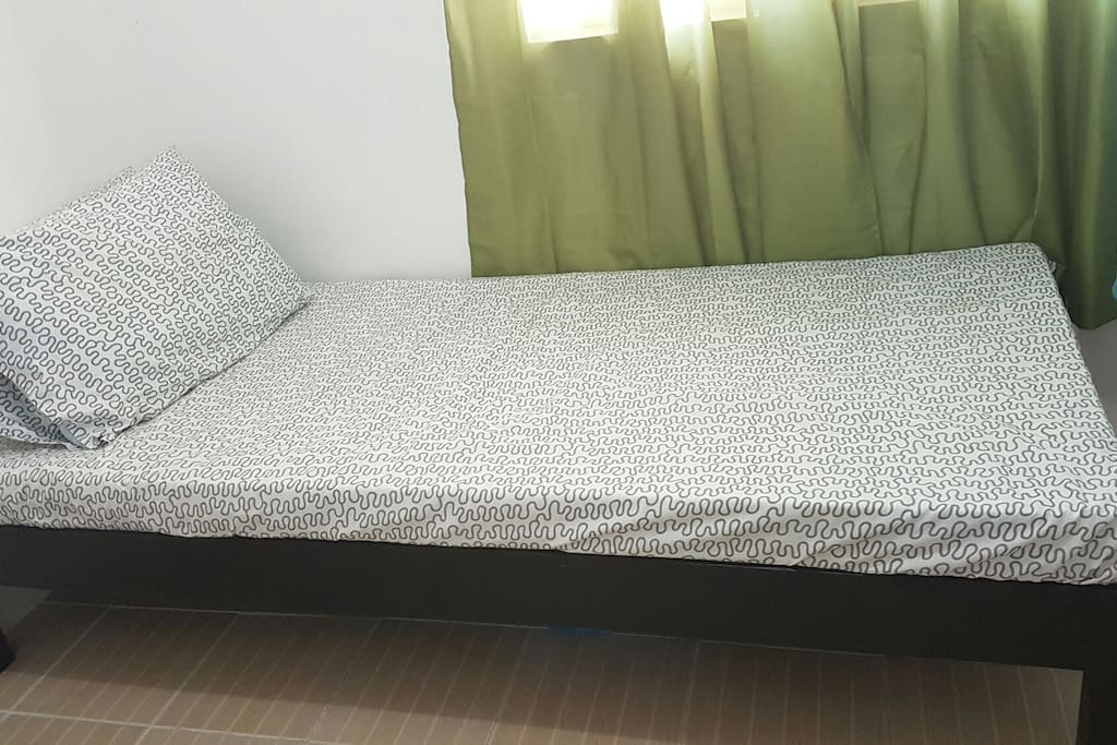 Comfie single bed with microfibre pillows.