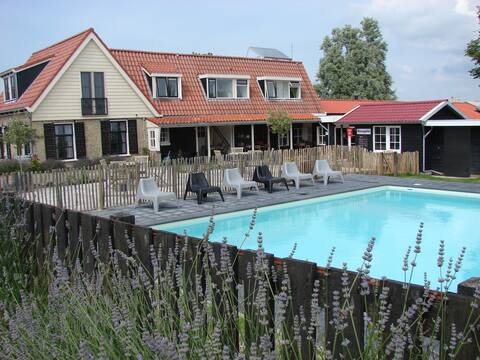 Stay in a spacious family home in Friesland