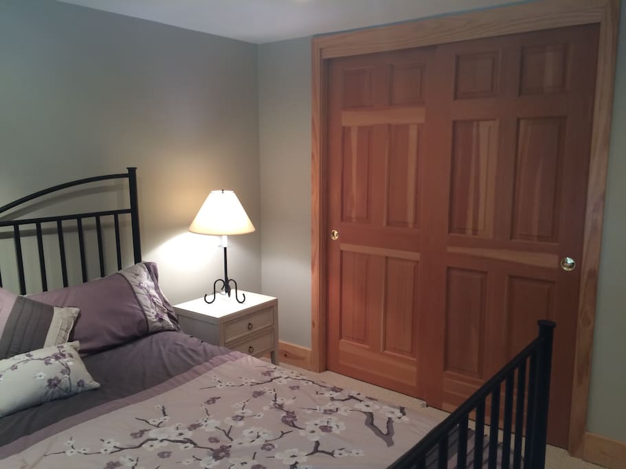 Queen size bed with closet space.