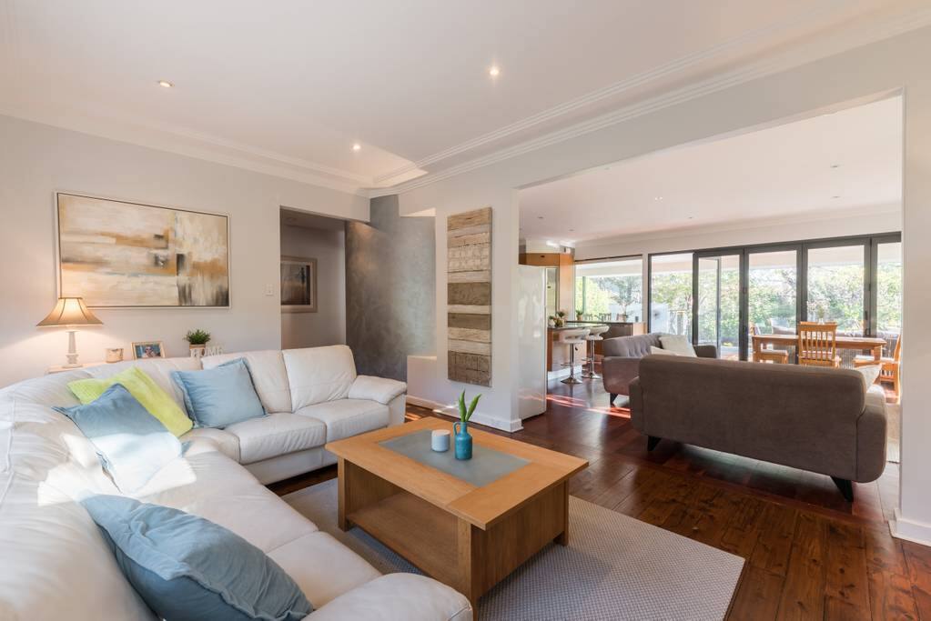 Resort-style lounge opening into a private entertaining area